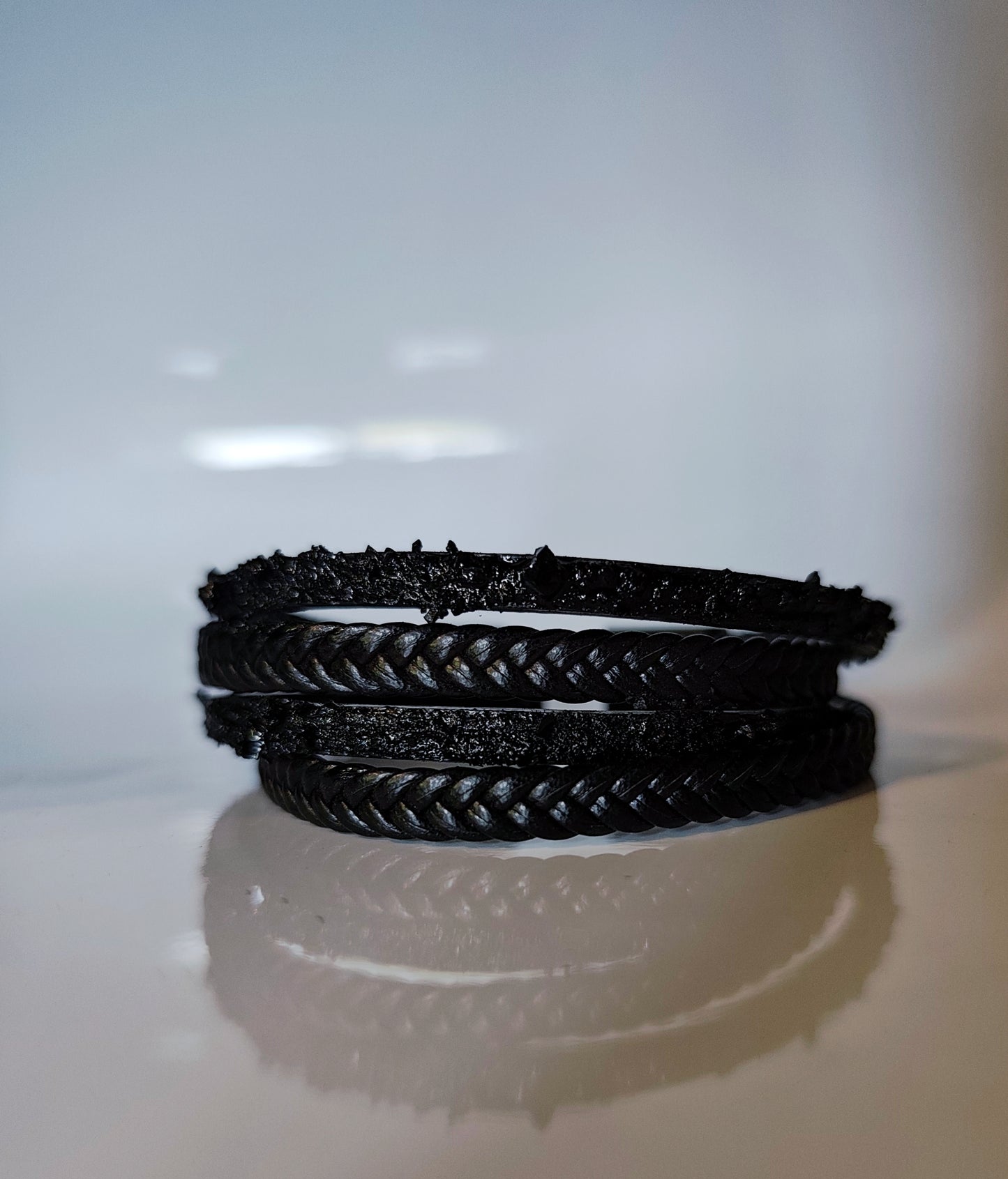 Leather Bracelet with Coal Accent
A refined blend of heritage and modern design. Handcrafted from premium leather, this bracelet features a unique weave of four straps and a symbolic element – natural Slovenian coal.
Available in two finishes:
🖤 Matte coal – for understated elegance
✨ High-gloss coal – for a bold, refined contrast
Details:
– Length: 18 cm
– Width: 2 cm
– Unisex: suitable for women and men
– Comes in a premium gift box
– Includes a story card about the coal's meaning and origin