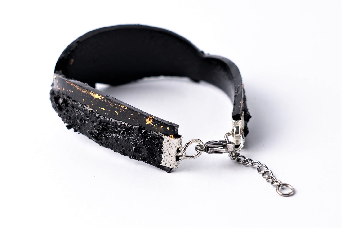 The KUOLMi Rosegold bracelet is made of 10 million-year-old coal. Due to its black luster and special organic shape, you will be noticed at all times. This bracelet will instantly upgrade your styling. A statement piece that combines edgy attitude and high fashion. You can choose a different style every day and upgrade it with this bracelet. You will rock them all- formal dress and high heels or something casual. This bracelet goes great with high heels, flip flops, and everything in between.