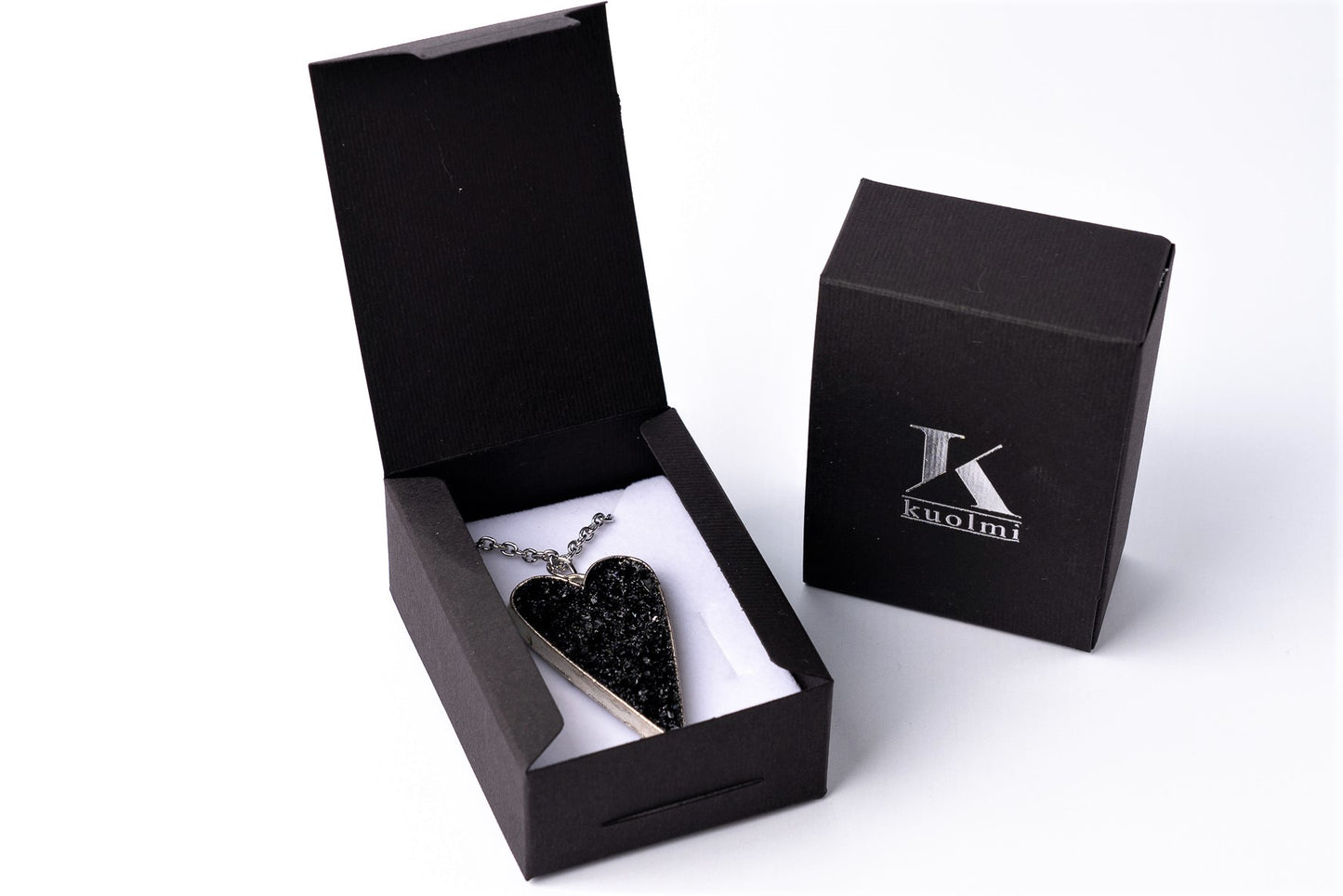 This awesome necklace is a mix of three styles: gentle timeless elegance, edgy steampunk, and classic rocker touch. It gives your outfit the right amount of emotions, elegance end edge. A perfect combination of heart softness, elegant stainless steel chains, and raw organically shaped natural coal… create a statement piece for various occasions.
