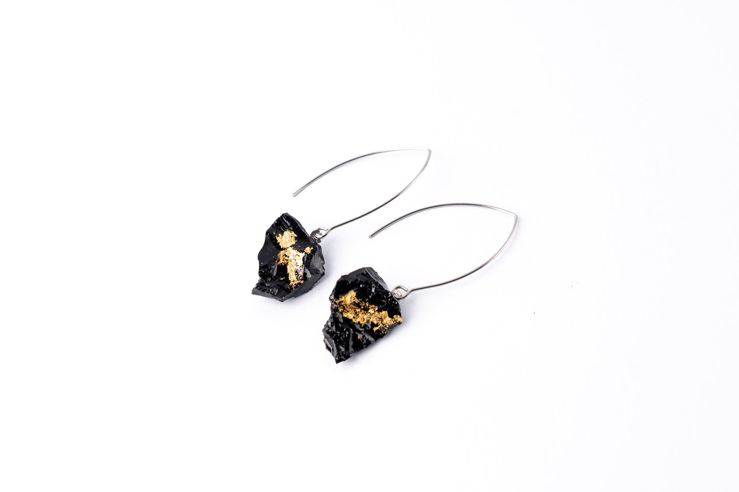 The 10 million-year-old stone will shine on you with all its brilliance. Try to combine these earrings with your daily outfit. It also looks special when you wear just one earring! The hooks are made of stainless steel: the color stays the same, the material is very durable, and causes no allergies. And most important, say goodbye to heavy earrings that feel uncomfortable – with KUOLMi, comfort always comes first!