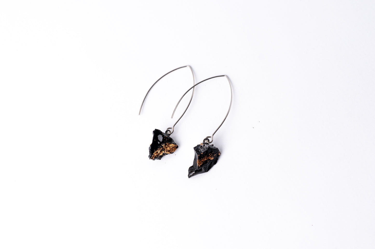 The 10 million-year-old stone will shine on you with all its brilliance. Try to combine these earrings with your daily outfit. It also looks special when you wear just one earring! The hooks are made of stainless steel: the color stays the same, the material is very durable, and causes no allergies. And most important, say goodbye to heavy earrings that feel uncomfortable – with KUOLMi, comfort always comes first!