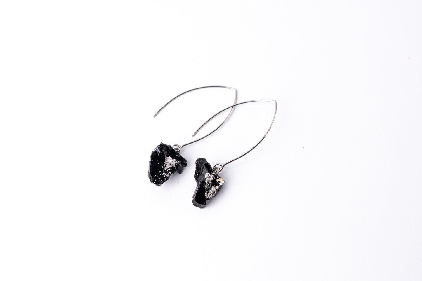 The 10 million-year-old stone will shine on you with all its brilliance. Try to combine these earrings with your daily outfit. It also looks special when you wear just one earring! The hooks are made of stainless steel: the color stays the same, the material is very durable, and causes no allergies. And most important, say goodbye to heavy earrings that feel uncomfortable – with KUOLMi, comfort always comes first!
