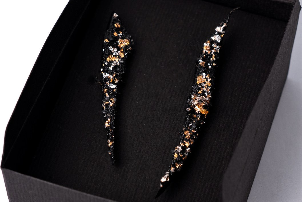 Enjoy the richness of this statement piece of jewelry. Beautiful and quality materials are joined in a timeless star shape. Textures and layers create a 3D effect. Wear a pair or only one earring, try it on causal styling or evening dress, these earrings are going to upgrade your styling 100%! Very light to wear. Free pair of protective stainless steel ear nuts come in a set.