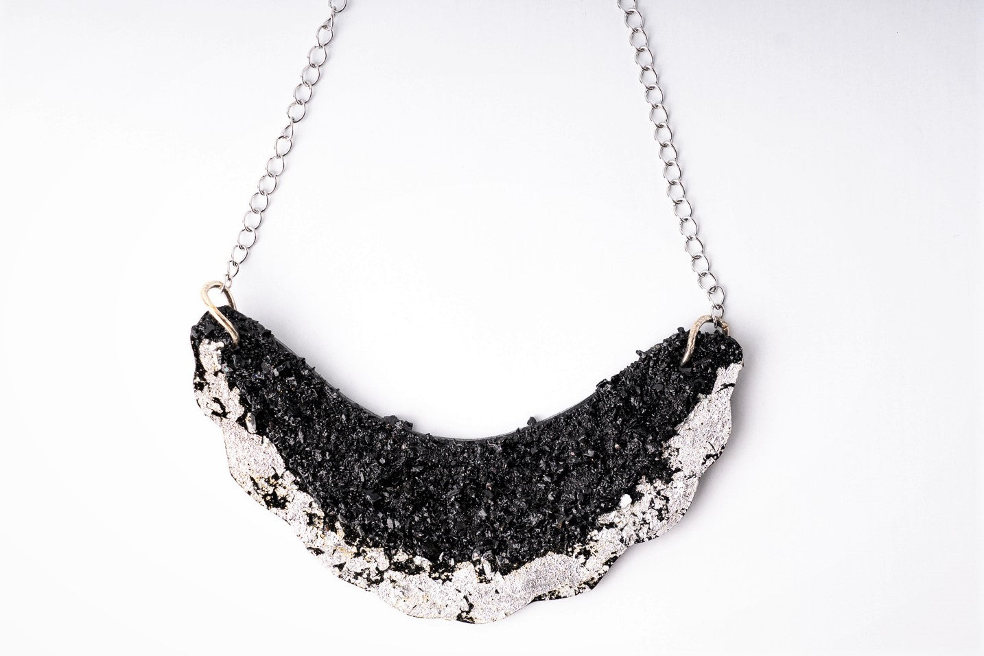 Wear it in black or white for the subtle and stylish upgrade of the styling. Try it in rich, solid colors, too, because it is going to look awesome with a red or purple blouse. With this necklace, winter sweaters won’t be boring anymore, and in summer try it on a simple top. Just don’t save it for special occasions. Because the special occasion is every day!