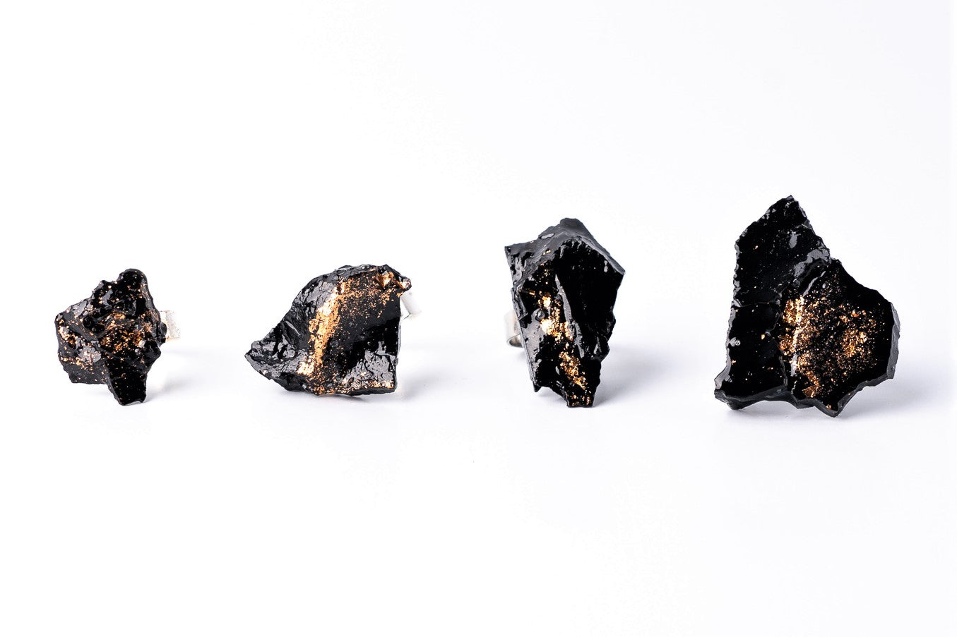 The 10 million-year-old stone will shine on your hand with all its brilliance. The ring is made of coal and stainless steel. This statement piece combines an edgy attitude and fashion. It is comfortable to wear and very durable at the same time. Try to wear it with various stylings, from casual to edgy. This ring brings elegance and a classy feel to any wardrobe.