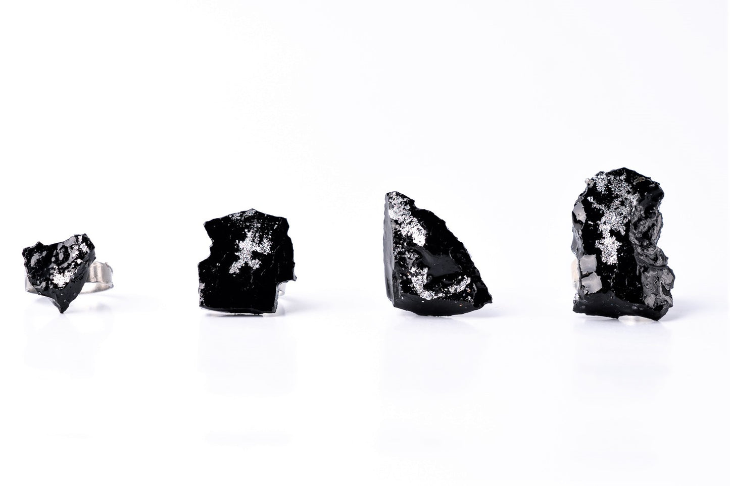 The 10 million-year-old stone will shine on your hand with all its brilliance. The ring is made of coal and stainless steel. This statement piece combines an edgy attitude and fashion. It is comfortable to wear and very durable at the same time. Try to wear it with various stylings, from casual to edgy. This ring brings elegance and a classy feel to any wardrobe.