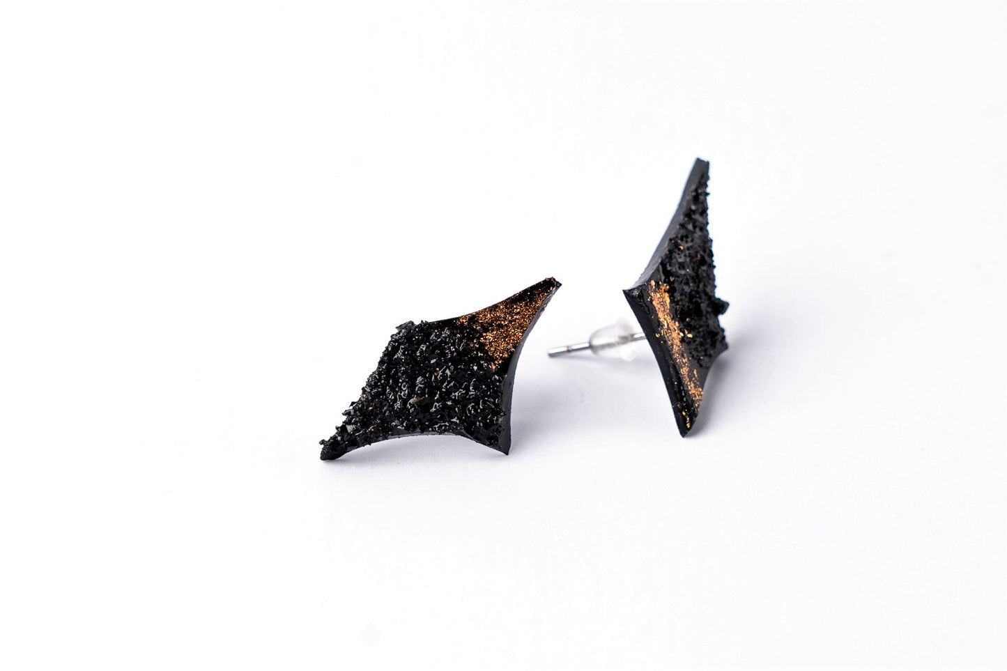 Enjoy the richness of this statement piece of jewelry. Beautiful and quality materials are joined in a timeless star shape. Textures and layers create a 3D effect. Wear a pair or only one earring, try it on causal styling or evening dress, these earrings are going to upgrade your styling 100%! Very light to wear. Free pair of protective stainless steel ear nuts come in a set.
