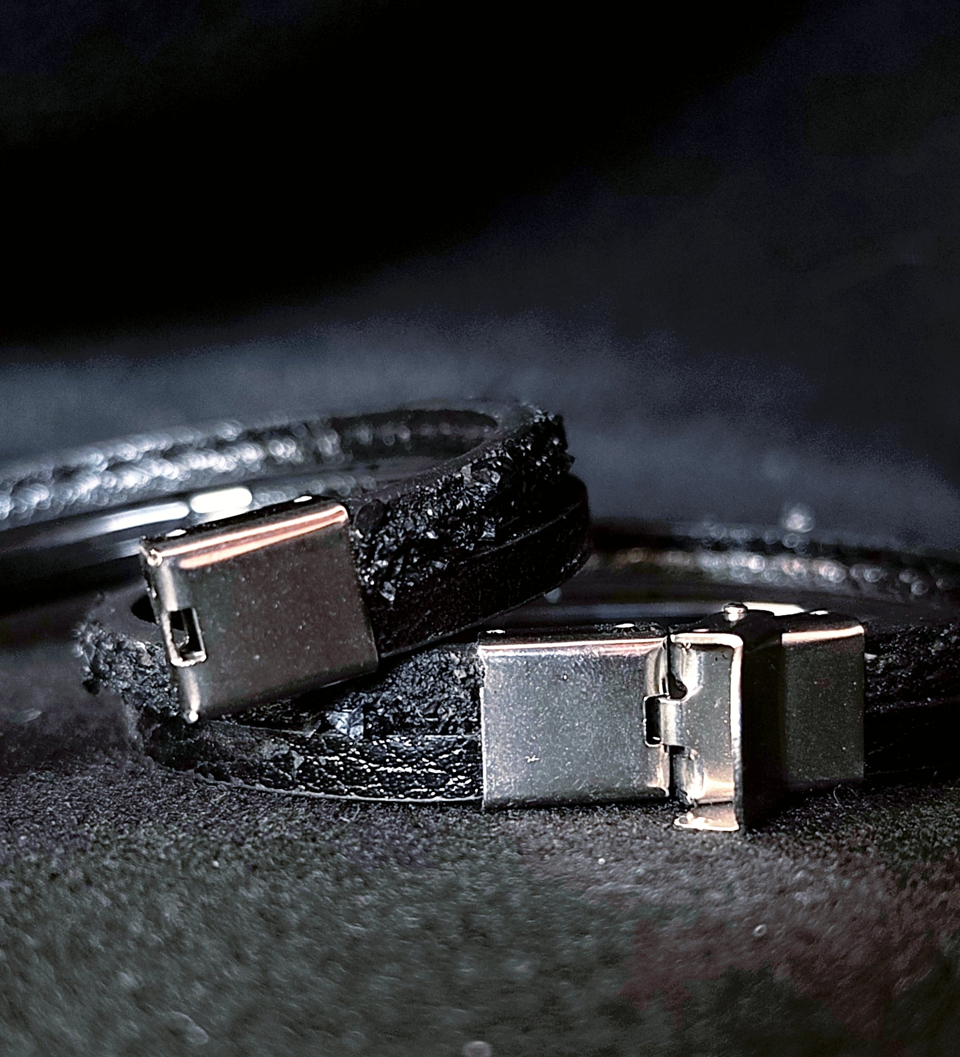 Leather Bracelet with Coal Accent
A refined blend of heritage and modern design. Handcrafted from premium leather, this bracelet features a unique weave of four straps and a symbolic element – natural Slovenian coal.

Available in two finishes:
🖤 Matte coal – for understated elegance
✨ High-gloss coal – for a bold, refined contrast

Details:
– Length: 22 cm
– Width: 2 cm
– Unisex: suitable for women and men
– Comes in a premium gift box
– Includes a story card about the coal's meaning and origin
