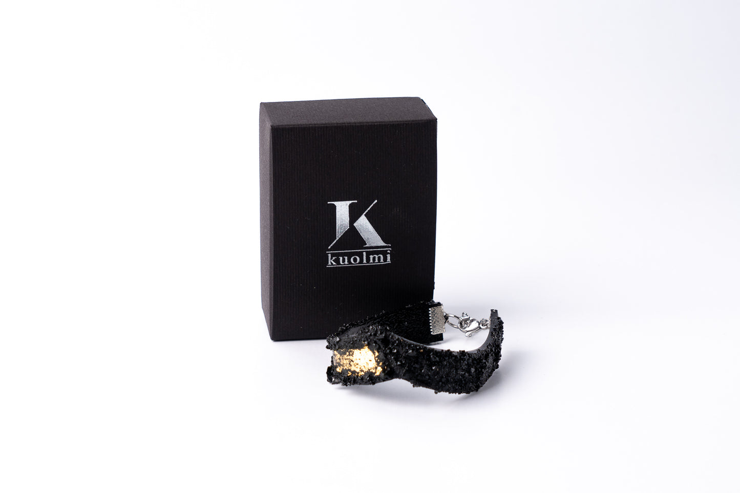 The KUOLMi Gold bracelet is made of 10 million-year-old coal.  Due to its black luster and special organic shape, you will be noticed at all times. This bracelet will instantly upgrade your styling. A statement piece that combines edgy attitude and high fashion.  You can choose a different style every day and upgrade it with this bracelet. You will rock them all-  formal dress and high heels or something casual. This bracelet goes great with high heels, flip flops, and everything in between.