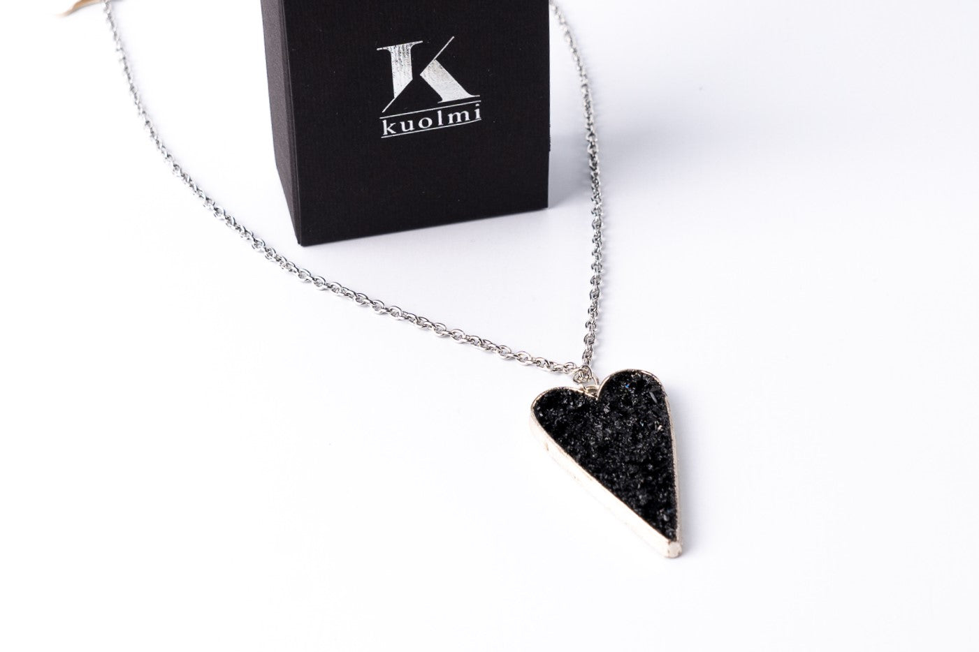 This awesome necklace is a mix of three styles: gentle timeless elegance, edgy steampunk, and classic rocker touch. It gives your outfit the right amount of emotions, elegance end edge. A perfect combination of heart softness, elegant stainless steel chains, and raw organically shaped natural coal… create a statement piece for various occasions.