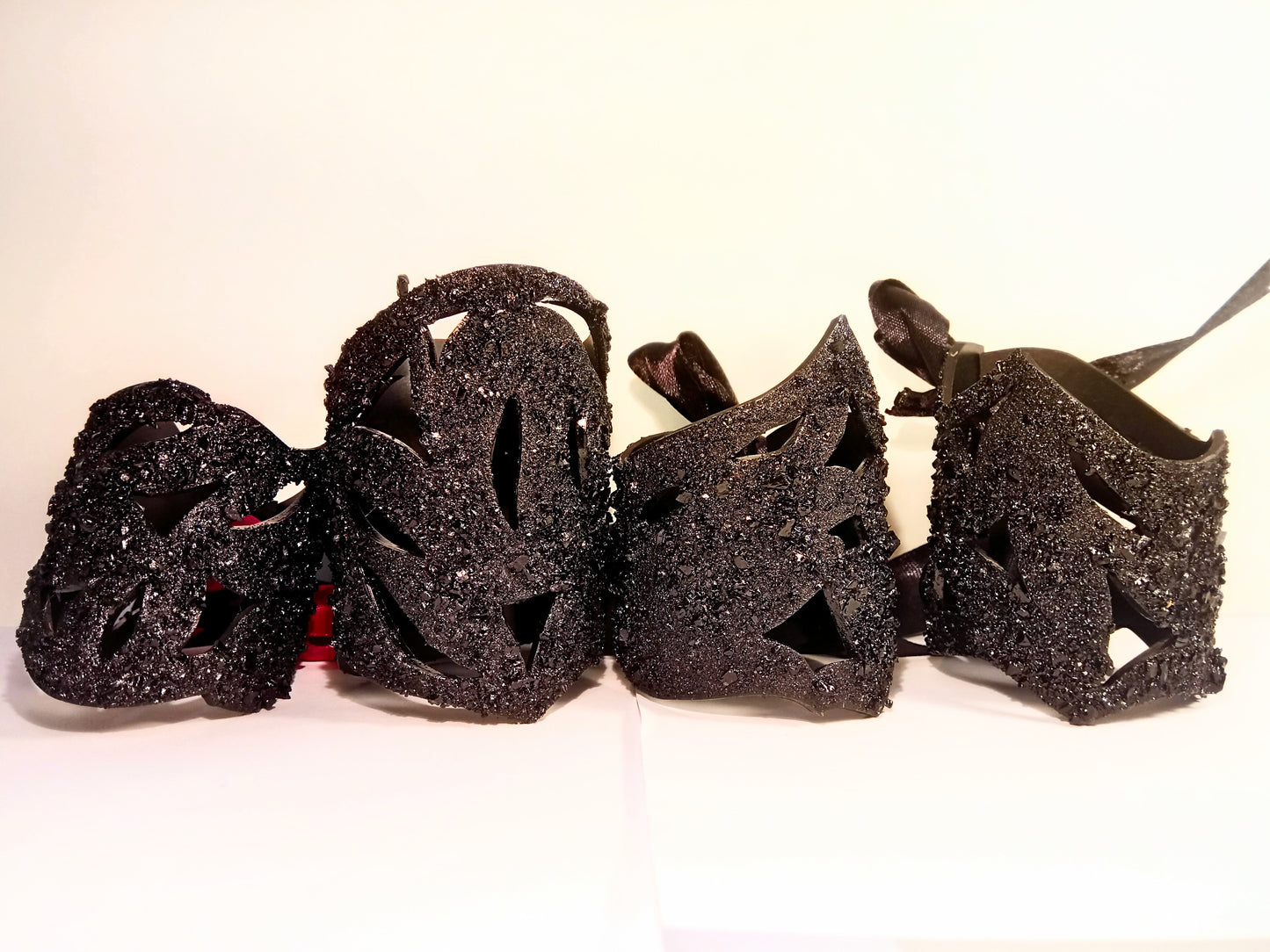 The KUOLMi Lace bracelet is made of 10 million-year-old stone. Due to its black luster and special organic shape, each piece is unique and unrepeatable in its appearance. It is made entirely by hand from coal and stainless steel. The size is adjustable. Jewelry is packaged in a gift box. The story about coal from which the bracelet was made is included as a gift.  Mighty and powerful.