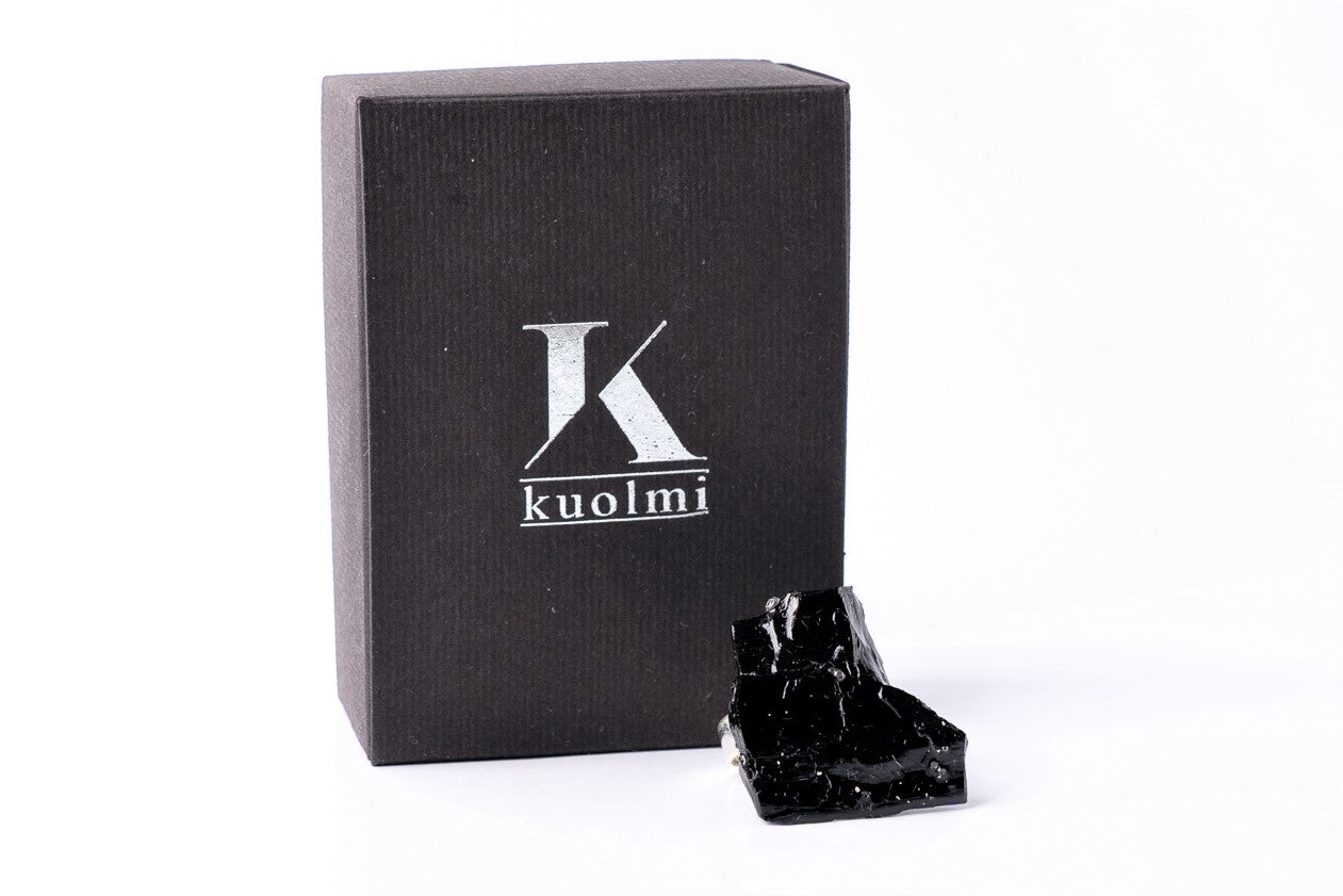 The KUOLMi handmade ring is a fantastic accessory that makes the look perfect. The 10 million-year-old stone will shine on your hand with all its brilliance. The ring is made of coal and stainless steel. It is adjustable in size. The image is symbolic because each piece is handmade, unrepeatable, and unique. The ring is packaged in gift packaging with an added description of the coal story.